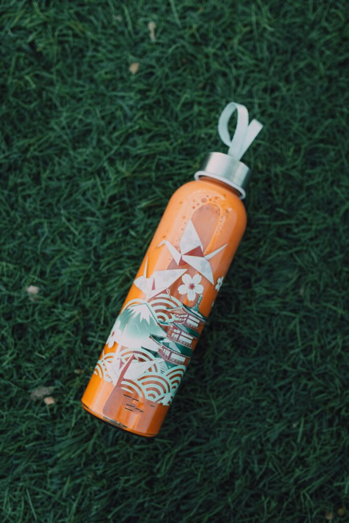 traveler enjoying a vegan breakfast smoothie while on the go