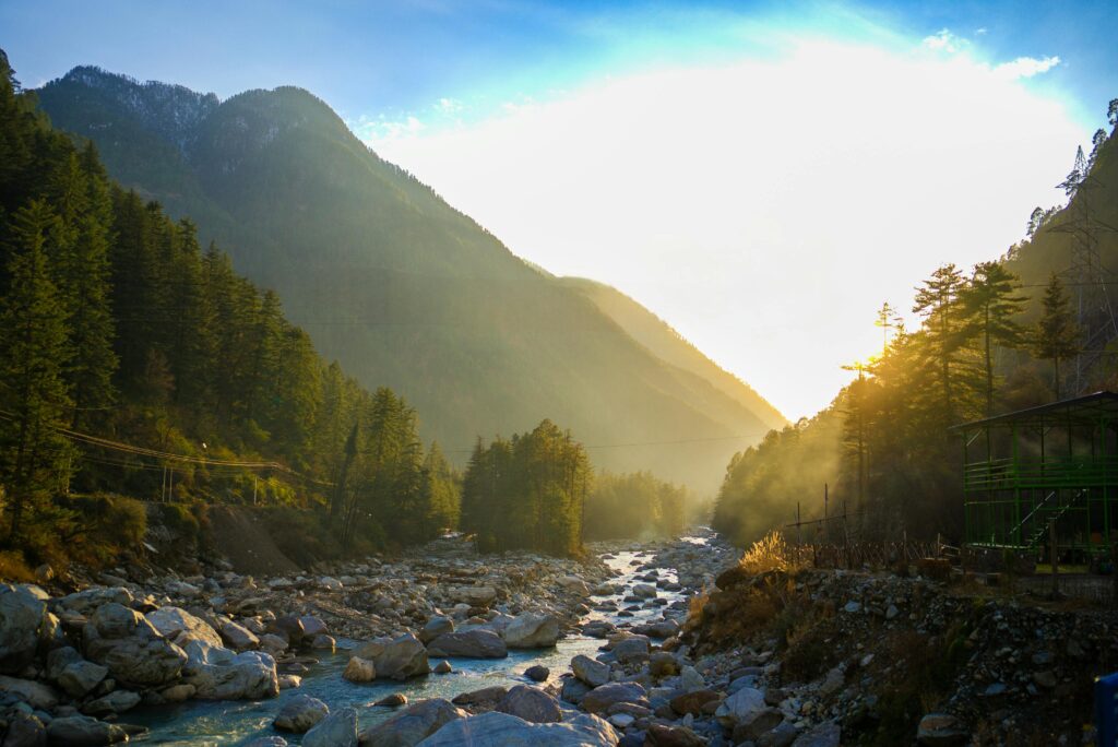"Serene destinations in India - Sunrise over mountains and rivers